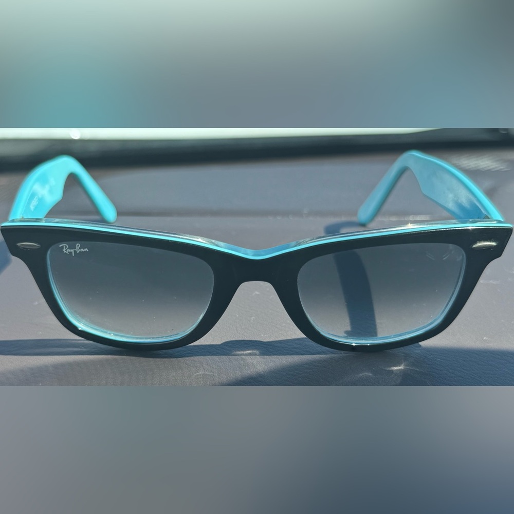 Ray-Ban Wayfarer. Black with blue ombré on lens and blue inside.